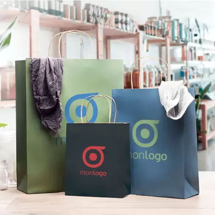 SAC PAPIER KRAFT PROMOTIONNEL ANSES TORSADEES 'HONDURO' 25X32X11 CM 90 GR/M²