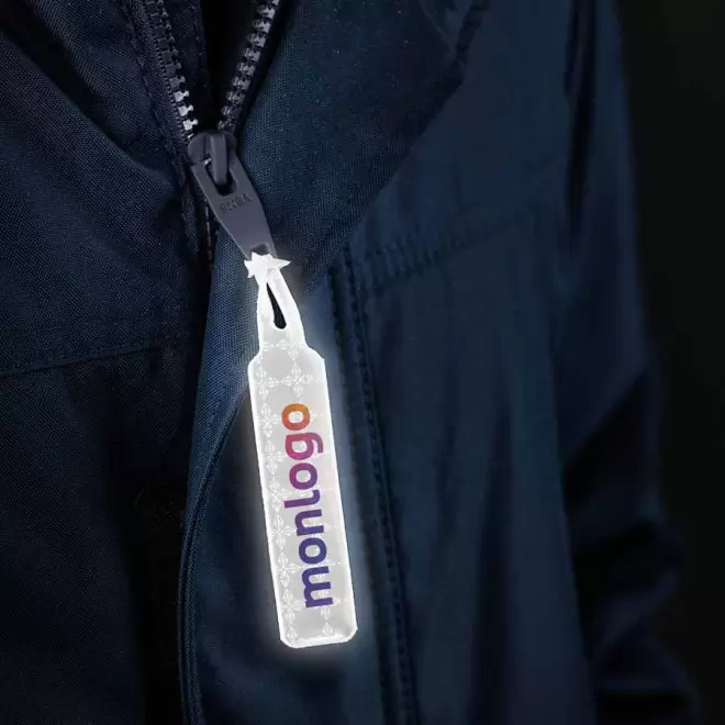 TIRE ZIP REFLECHISSANT PUBLICITAIRE  'TIRFLO'